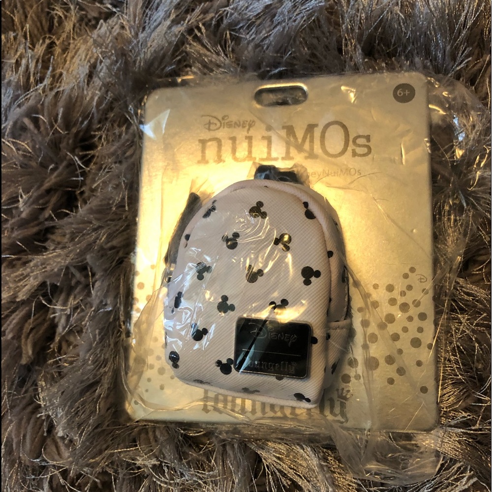 tiny LoungeFly Disney Nuimo’s backpack keychain NeW - Picture 2 of 9